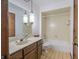 Bathroom with tub, toilet and vanity at 877 Revere Ct, Greenwood, IN 46142