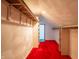 Spacious walk-in closet with red carpet and built-in shelves at 877 Revere Ct, Greenwood, IN 46142