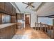 Spacious kitchen with an island, wooden cabinets, and hardwood floors at 877 Revere Ct, Greenwood, IN 46142