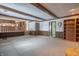 Open living room with a view of the kitchen and staircase at 877 Revere Ct, Greenwood, IN 46142
