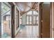 Sunroom with tiled floor, hot tub, and many windows at 877 Revere Ct, Greenwood, IN 46142