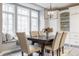 Cozy breakfast nook with large windows, a dining table, and comfortable seating at 9399 Irishmans Run Ln, Zionsville, IN 46077