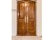 Ornate, double wood front doors featuring decorative handles and hardware at 9399 Irishmans Run Ln, Zionsville, IN 46077