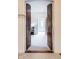 Ornate, double wood doors opening to a bright hallway and bedroom beyond at 9399 Irishmans Run Ln, Zionsville, IN 46077