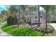 Charming white brick two-story home with manicured lawn and mature trees at 9399 Irishmans Run Ln, Zionsville, IN 46077