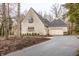 Charming brick home with an attached garage and a well-maintained driveway at 9399 Irishmans Run Ln, Zionsville, IN 46077
