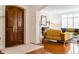Inviting foyer leading to a bright living area with a fireplace and large windows at 9399 Irishmans Run Ln, Zionsville, IN 46077