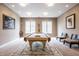 Game room featuring a tan pool table with a matching rug, seating, and neutral walls at 9399 Irishmans Run Ln, Zionsville, IN 46077