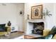 Cozy living room with a fireplace, stylish decor, and ample natural light at 9399 Irishmans Run Ln, Zionsville, IN 46077