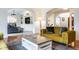 Comfortable living room with plush seating, an area rug, and hardwood floors at 9399 Irishmans Run Ln, Zionsville, IN 46077