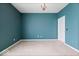 Charming bedroom with teal walls and neutral carpet at 1088 Laurelwood Ln, Greenwood, IN 46142