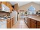 Fully equipped community kitchen with ample counter space and appliances at 1088 Laurelwood Ln, Greenwood, IN 46142