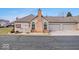 Ranch style home with a brick facade and attached two car garage at 1088 Laurelwood Ln, Greenwood, IN 46142