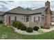 Ranch-style home with landscaped yard and neutral exterior at 1088 Laurelwood Ln, Greenwood, IN 46142