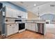 Bright kitchen with white cabinets, stainless steel appliances, and granite countertops at 1088 Laurelwood Ln, Greenwood, IN 46142