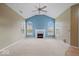 Living room with vaulted ceiling, fireplace and neutral wall colors at 1088 Laurelwood Ln, Greenwood, IN 46142