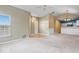Open concept living and kitchen area with neutral decor and high ceilings at 1088 Laurelwood Ln, Greenwood, IN 46142