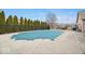 Community swimming pool with a winter cover at 1088 Laurelwood Ln, Greenwood, IN 46142