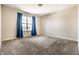 Bright and airy bedroom with large window and neutral carpet at 10917 Hunter Lake Ln, Indianapolis, IN 46239