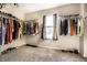 Large walk-in closet with shelving for ample storage at 10917 Hunter Lake Ln, Indianapolis, IN 46239