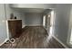 Living room with fireplace and wood-look floors at 1459 W 33Rd St, Indianapolis, IN 46208