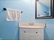 Clean bathroom with corner vanity, granite countertop, and mirror at 1743 Sparrow Ave, Indianapolis, IN 46227