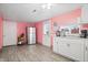 Stainless steel refrigerator and white kitchen cabinets at 1743 Sparrow Ave, Indianapolis, IN 46227