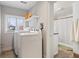 Laundry room with side-by-side washer and dryer at 1743 Sparrow Ave, Indianapolis, IN 46227
