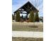 Community gazebo with benches and evergreen trees at 19438 Astoria Ave, Sheridan, IN 46069