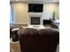 Cozy living room with fireplace and comfortable seating at 19438 Astoria Ave, Sheridan, IN 46069