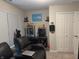 Entertainment room equipped with a popcorn machine, mini-fridge, and comfortable seating at 19438 Astoria Ave, Sheridan, IN 46069