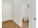 Clean bathroom with toilet, bathtub, and vinyl flooring at 19723 Atwater Ave, Sheridan, IN 46069