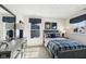 Cozy bedroom with a plaid comforter and a dresser at 19723 Atwater Ave, Sheridan, IN 46069