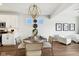 Elegant dining area with a round table and modern chandelier at 19723 Atwater Ave, Sheridan, IN 46069