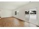Spacious Gathering room with hardwood floors and sliding glass doors at 19723 Atwater Ave, Sheridan, IN 46069
