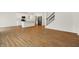 Spacious living room with hardwood floors and a view into the kitchen at 19723 Atwater Ave, Sheridan, IN 46069