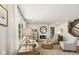 Living room with fireplace, comfortable seating, and large windows at 19723 Atwater Ave, Sheridan, IN 46069