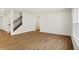 Bright living room with hardwood floors and stairway at 19723 Atwater Ave, Sheridan, IN 46069