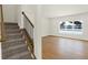 Modern stairway with dark wood and metal railing at 19723 Atwater Ave, Sheridan, IN 46069