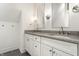 Bathroom with double vanity and granite countertop at 2301 Nowland Ave, Indianapolis, IN 46201