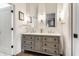Elegant bathroom with double vanity and marble countertops at 2301 Nowland Ave, Indianapolis, IN 46201