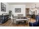 Modern dining room with hardwood floors and a farmhouse table at 2301 Nowland Ave, Indianapolis, IN 46201