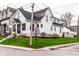 Angle front exterior of house with street and neighborhood sign at 2301 Nowland Ave, Indianapolis, IN 46201