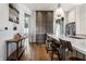 Stylish kitchen with gray cabinets, quartz countertops and a large island at 2301 Nowland Ave, Indianapolis, IN 46201