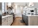 Open concept kitchen with large island and hardwood floors at 2301 Nowland Ave, Indianapolis, IN 46201