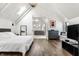 Large main bedroom with ensuite bathroom and hardwood floors at 2301 Nowland Ave, Indianapolis, IN 46201