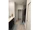 Bathroom with double vanity, shower, and linen closet at 2746 Lanai Ln, Greenwood, IN 46143