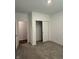 Bright bedroom with large closet and neutral carpeting at 2746 Lanai Ln, Greenwood, IN 46143