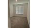 Spacious bedroom with neutral carpeting and large window with blinds at 2746 Lanai Ln, Greenwood, IN 46143