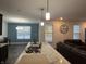 Kitchen with granite countertop island and dark cabinets at 2746 Lanai Ln, Greenwood, IN 46143